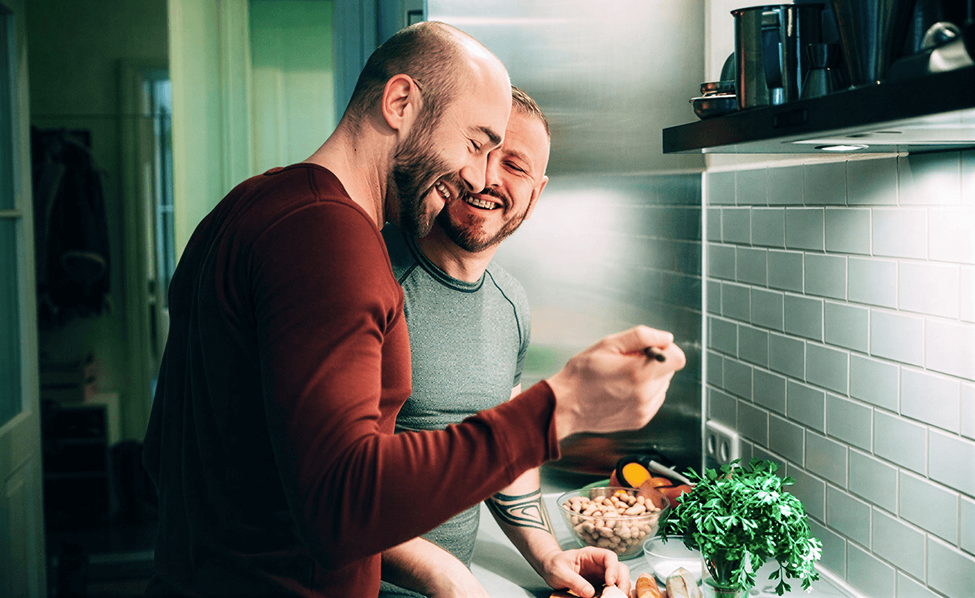 Two men cooking