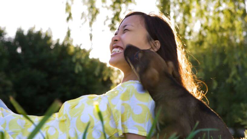 Happy woman with dog.