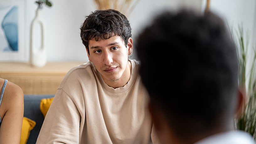Young man in a mental health appointment.