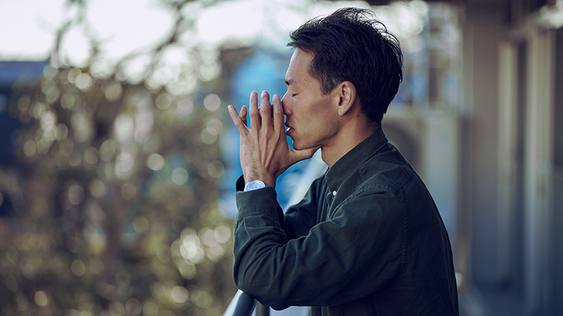 Younger man working to keep calm.