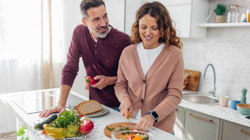 Couple preparing a healthy meal together in the kitchen