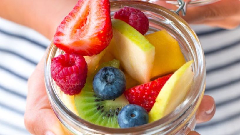 Glass jar of fruit salad.