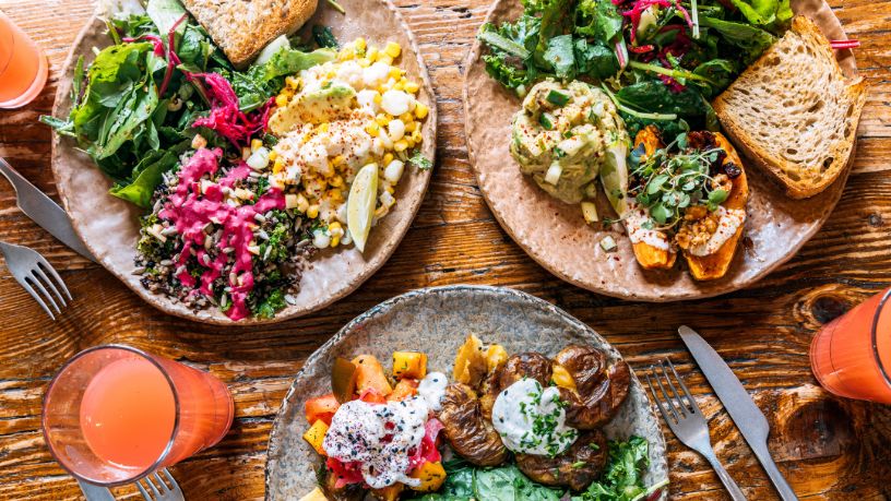 3 plates with healthy food on them.