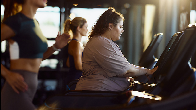 A woman on the treadmill. 