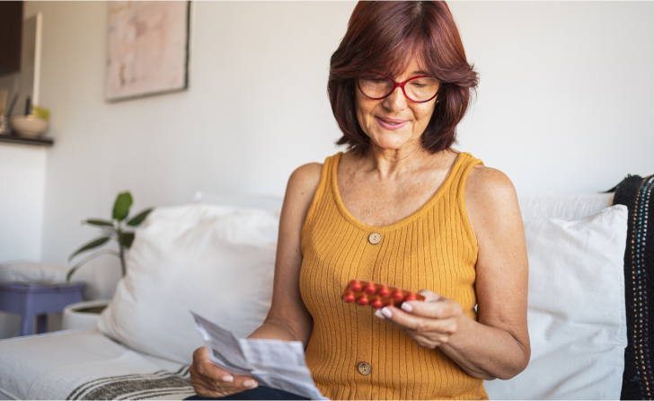 Woman reading medication